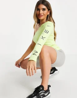 Nike Asymmetric Long Sleeve Top In Yellow For Women Lt Lemon Twist
